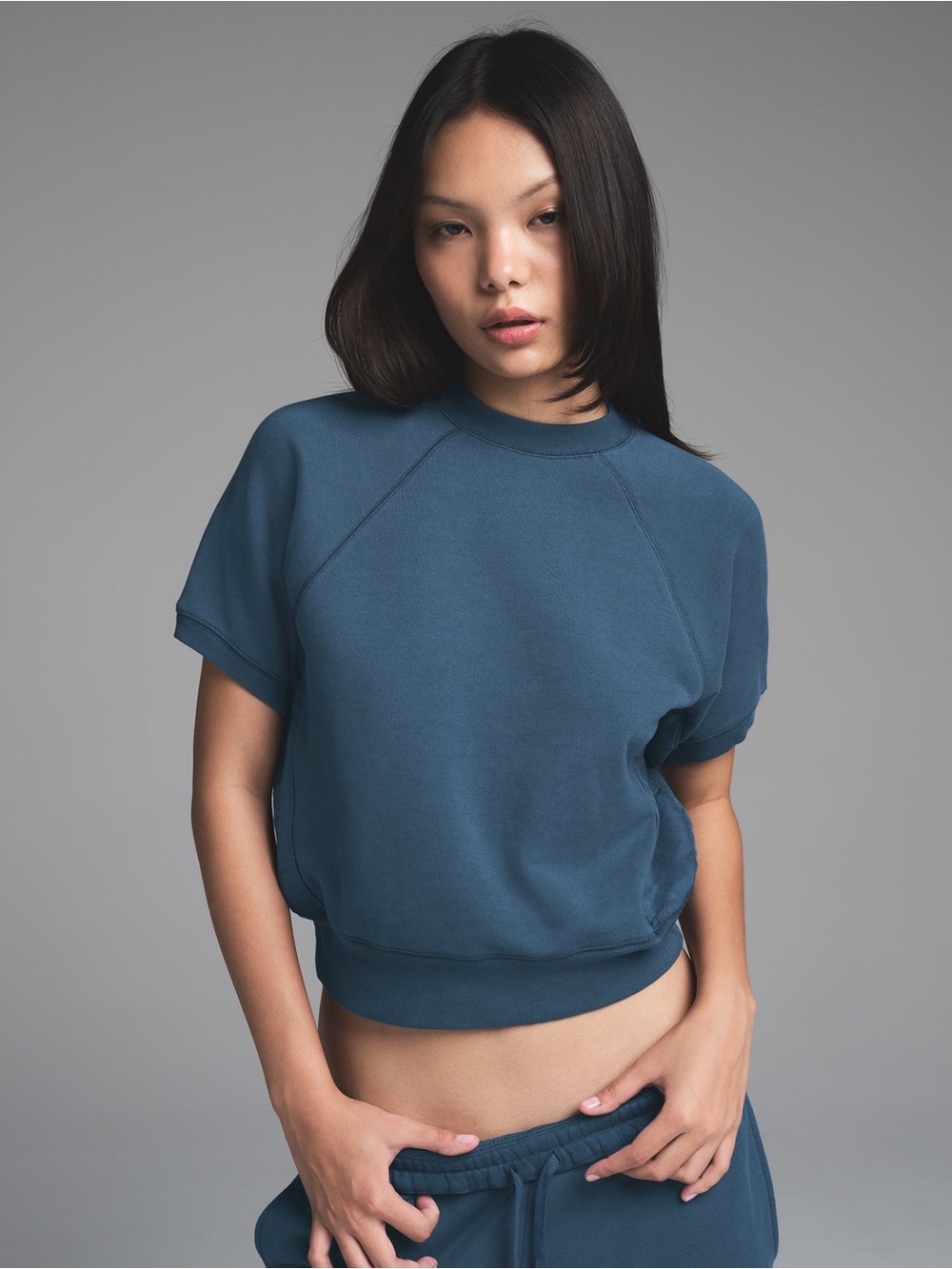 The SKIMS French Terry Raglan Short Sleeve Sweatshirt